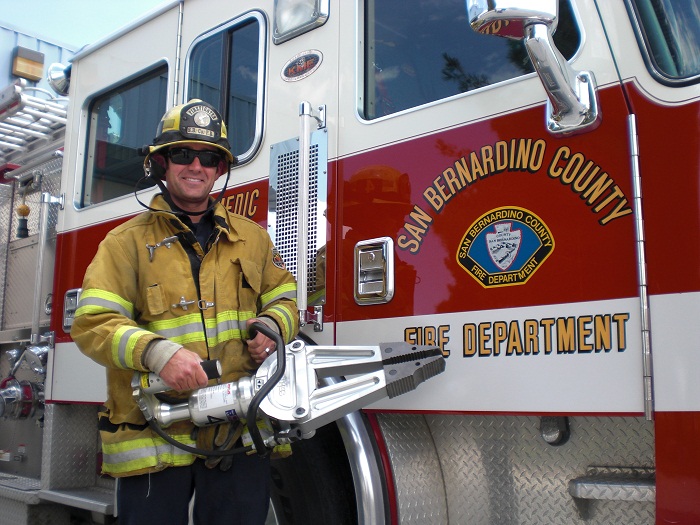 A staff from San Bernardino County Fire Department getting ready for his duty